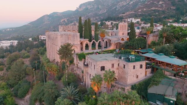 Bellapais Monastery aerial sunset view in Bellapais village, North Cyprus