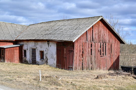 old timeworn red and white barn Kumla Sweden