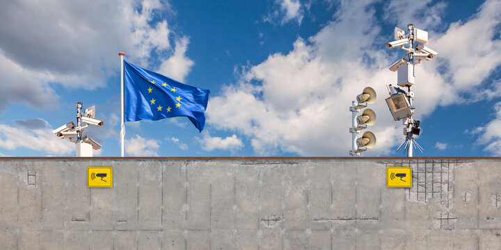 Conceptual image of an European border security wall with EU flag and surveillance camera's
