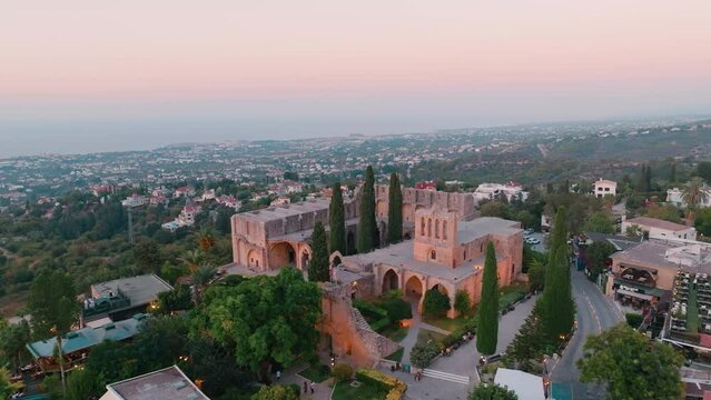 Bellapais Monastery aerial sunset view in Bellapais village, North Cyprus