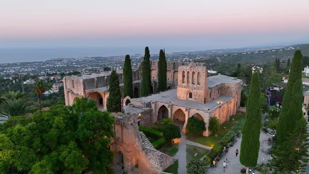 Bellapais Monastery aerial sunset view in Bellapais village, North Cyprus