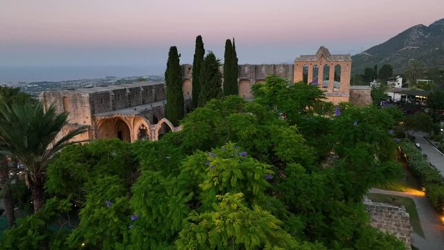 Bellapais Monastery aerial sunset view in Bellapais village, North Cyprus