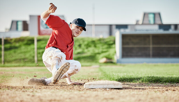 Baseball, sports and man slide on field for competition, game or practice outdoors. Training, workout and player, athlete or male base runner in action match, exercise and competitive tournament.