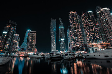 Burj, dubai mall and surroundings, a city shrouded in light, tourists and monuments,UAE - United Arab emirates