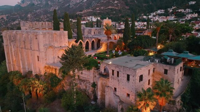 Bellapais Monastery aerial sunset view in Bellapais village, North Cyprus