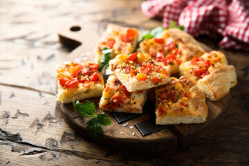 Traditional homemade focaccia with tomatoes