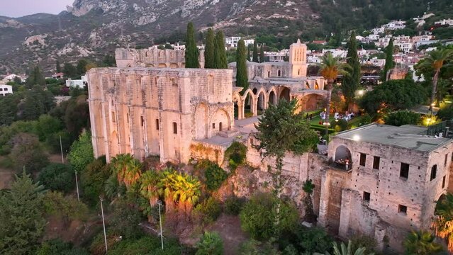 Bellapais Monastery aerial sunset view in Bellapais village, North Cyprus