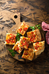 Traditional homemade focaccia with tomatoes