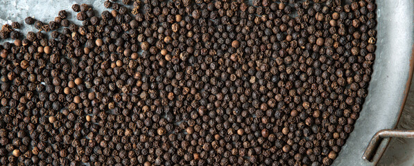 black peppercorns as a background