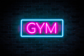 GYM text neon banner on brick wall background.
