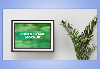 Picture Frame on the Wall Mockup 