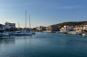Fototapeta na wymiar residential houses and yachts in Port Alacati Marina (Cesme, Izmir province, Turkey)