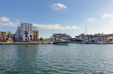 Obraz premium residential houses and yachts in Port Alacati Marina (Cesme, Izmir province, Turkey)