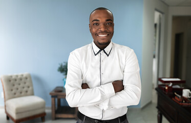 Portrait Cheerful African Businessman, Arms Crossed