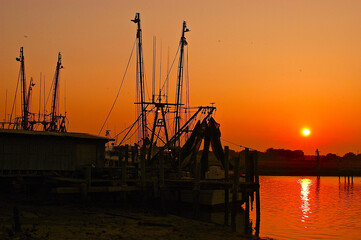 Fototapeta na wymiar Fishing Trawlers at Sunset