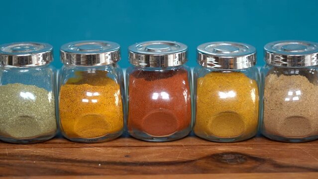 Spices for cooking - Cumin, paprika, curry, turmeric, chilli pepper, pepper, salt, ginger are typical spices of African Moroccan Indian cuisine - health and well-being in  kitchen - Mediterranean diet