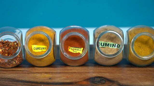 Spices for cooking - Cumin, paprika, curry, turmeric, chilli pepper, pepper, salt, ginger are typical spices of African Moroccan Indian cuisine - health and well-being in  kitchen - Mediterranean diet