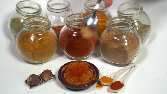 Spices for cooking - Cumin, paprika, curry, turmeric, chilli pepper, pepper, salt, ginger are typical spices of African Moroccan Indian cuisine - health and well-being in  kitchen - Mediterranean diet