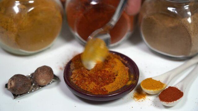 Spices for cooking - Cumin, paprika, curry, turmeric, chilli pepper, pepper, salt, ginger are typical spices of African Moroccan Indian cuisine - health and well-being in  kitchen - Mediterranean diet