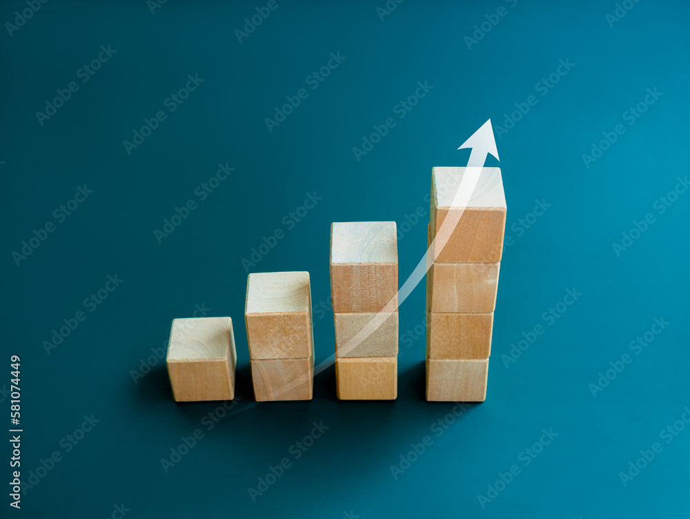 Poster white rising up arrow draw on wooden cube blocks bar graph chart steps on blue background, minimal s