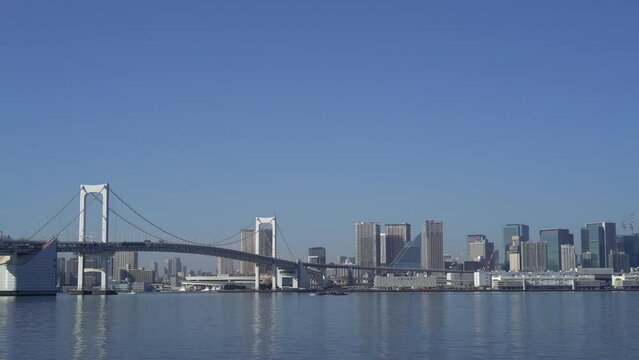 White bridge with city skyline at Tokyo