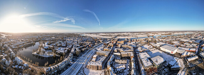 Panorama 180 degrees ready for VR winter wonderland Noorderhaven neighbourhood and tower town Zutphen, The Netherlands. Aerial cityscape after a snowstorm.