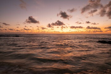 Oceanscape during the sunset with waves and rock, Ascension island
