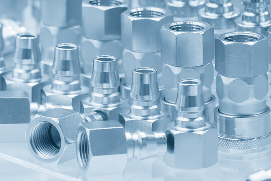 Close up scene quick release  coupling connector fitting parts in the light blue scene.