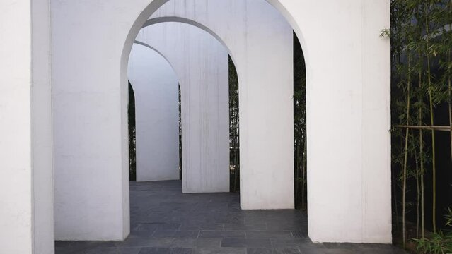 white wall with arch door