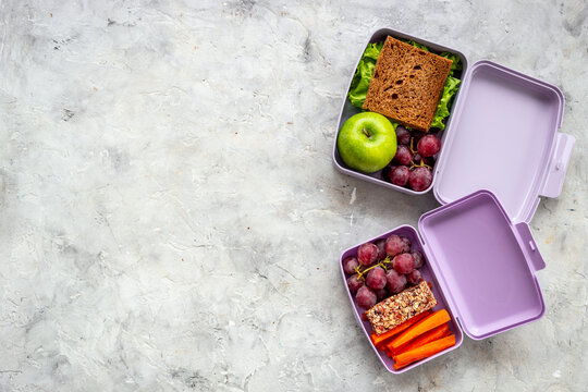 Healthy lunch boxes with sandwich and fruits. Healthy school meal