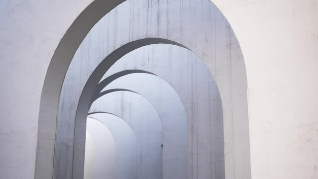 white wall with arch door