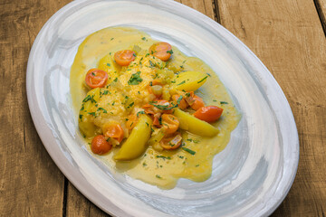 stockfish, livornese, sauce, boiled, potatoes, cherry tomatoes,