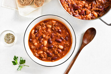 Stewed beans with ground beef, jalapeno pepper and bacon