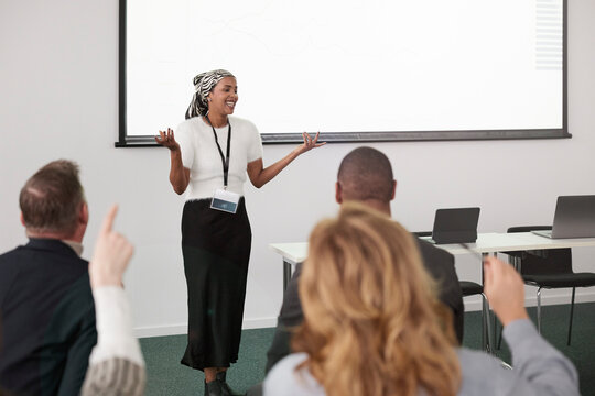 Woman having presentation during business seminar