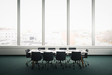 View of meeting table in empty boardroom