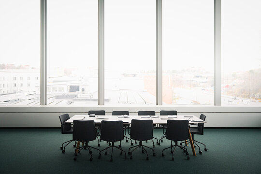 View of meeting table in empty boardroom