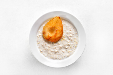 Oat porridge with caramelized pear and peanut