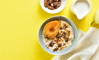 Oat porridge with caramelized pear and chocolate pieces