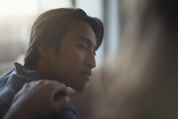 Friend consoling sad depressed man