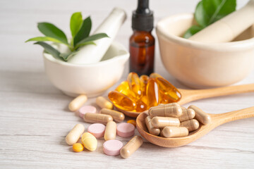 Alternative medicine herbal organic capsule with vitamin E omega 3 fish oil, mineral, drug with...