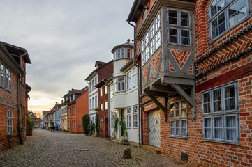 Fototapeta na wymiar Street with Medieval old brick buildings in Luneburg. Germany