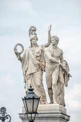Fototapeta na wymiar Berlin, Germany - June 8, 2021: View at Roman statues in the ancient Castle Bridge near Berlin Cathedral and Unter den Linden street in historical and museum downtown of Berlin