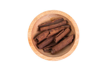 Cinnamon sticks in wooden bowls isolated on white background, herbs