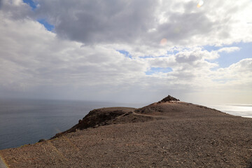 Fototapeta na wymiar Panoramic view of the Cuchillos de Vigán and the desert land over the Atlantic ocean in Fuerteventura