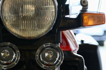 headlight and horns of a motorcycle