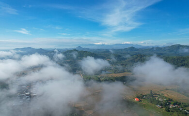 High above view of soft cloud flowing with naure mountain view after rainy season