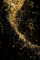 golden particles and glowing lights effect - 581138831