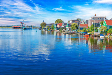 Obraz premium Zaandijk, Netherlands. Panorama of traditional dutch houses at the Zaan river in Zaandijk, Netherlands.