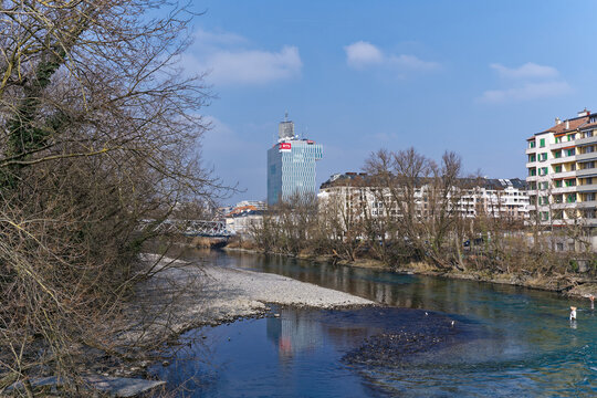River L'Arve with Headquarters of RTS SGR Swiss French television and radio in the background at Swiss City of Geneva on a sunny winter day. Photo taken March 5th, 2023, Geneva, Switzerland.