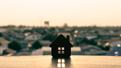 House model on wood table. Real estate agent offer house, property insurance and security,...